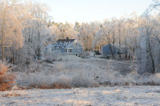 212 house surrounded in ice