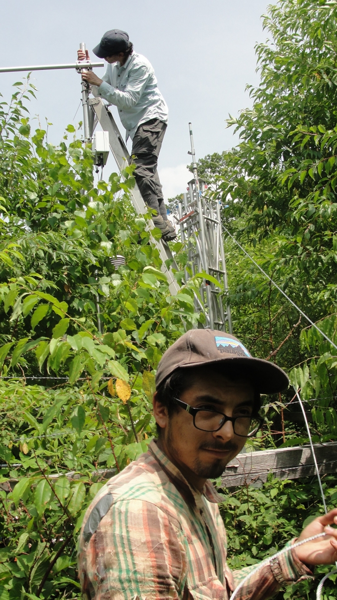 [Josh Alaniz with his mentor, Dr. Christopher Williams, working on an eddy-flux tower.]