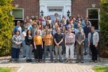 Photo shows students and mentors in front of Harvard Forest's main building