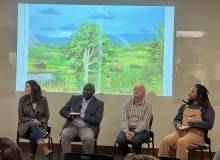 Four Bullard Fellows sit in the Fisher Museum to discuss their work