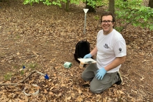 Luca Morreale collecting data at a forest edge in the Arnold Arboretum