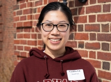 Image shows Cynthia Liu in front of the Harvard Forest Fisher Museum.