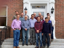 Researchers stand in front of Shaler Hall