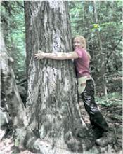 REU student Kate Eisen with tree