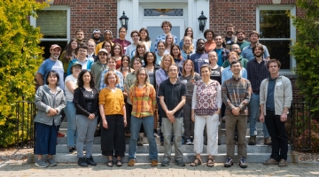 Photo shows students and mentors in front of Harvard Forest's main building