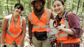 From left to right, image shows students Julia Marquis and Naturi Scott with mentor Marissa Hanley. By Hannah Naughton.