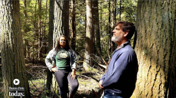 Image shows Keshia De Freece Lawrence, left, leaning against a tree. Neil Pederson is leaning against a different tree to the right.