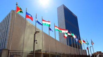 Image shows the United Nations headquarters in New York City.