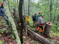 Photo shows Stambaugh working with a group of fire managers and scientists from throughout the northeastern U.S. on the Green Mountain National Forest in Vermont