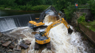 Construction equipment in a dam.